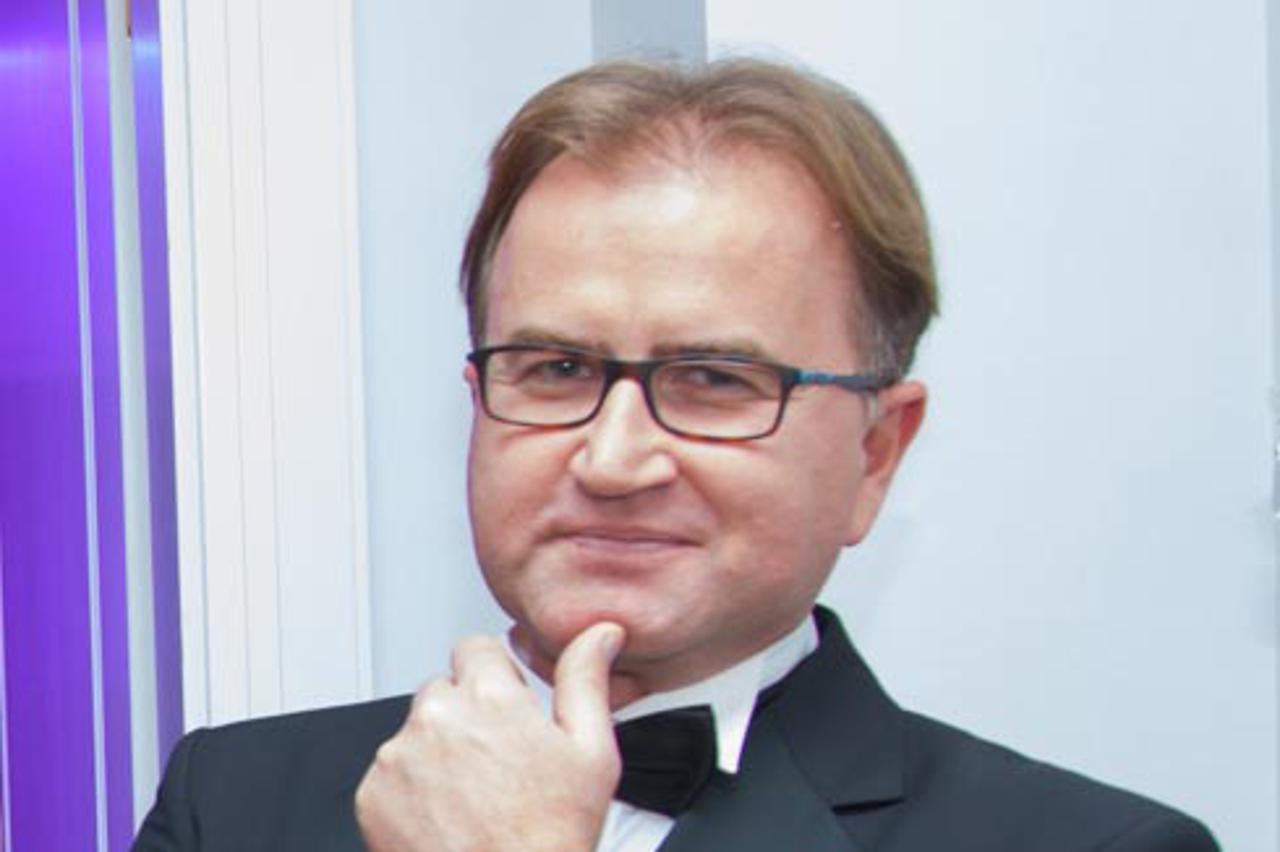 RAYMOND ROJNIK